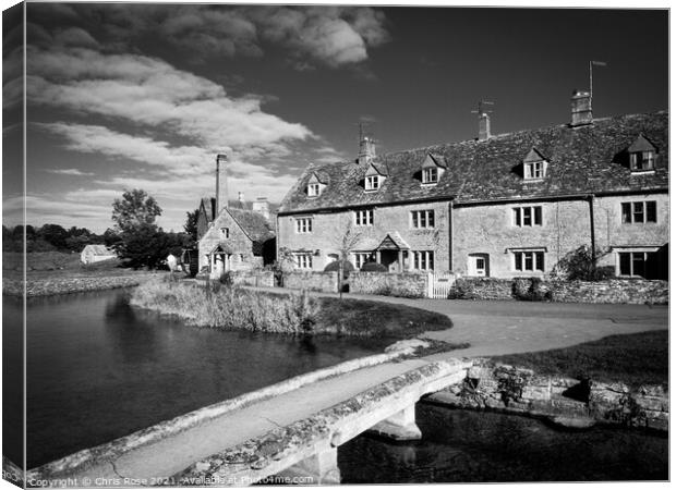 Lower Slaughter, idyllic riverside cottages Canvas Print by Chris Rose
