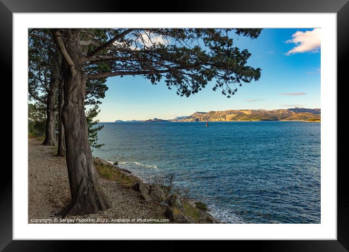 Blue sky over mountains on adriatic coast Framed Mounted Print by Sergey Fedoskin