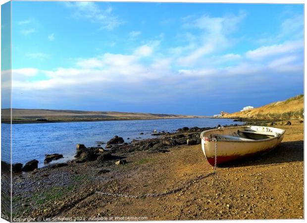 Boat on the beach Canvas Print by Les Schofield