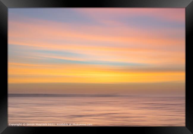 Blurred sunrise Framed Print by Simon Maycock