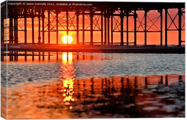 Under The Pier Sunset. Canvas Print by Jason Connolly