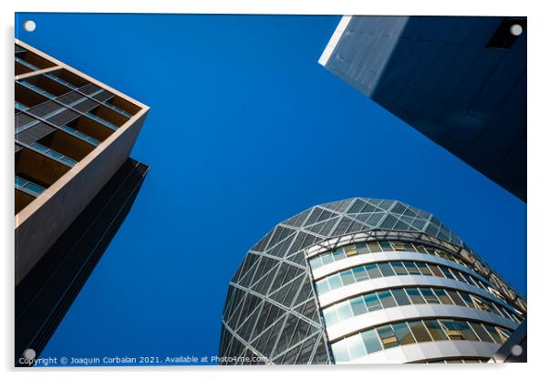Tall office buildings, viewed from below, modern and rounded, wi Acrylic by Joaquin Corbalan