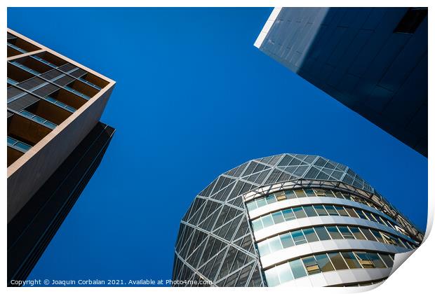 Tall office buildings, viewed from below, modern and rounded, wi Print by Joaquin Corbalan