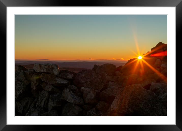 Sunset over a stone Cairn Framed Mounted Print by Leighton Collins