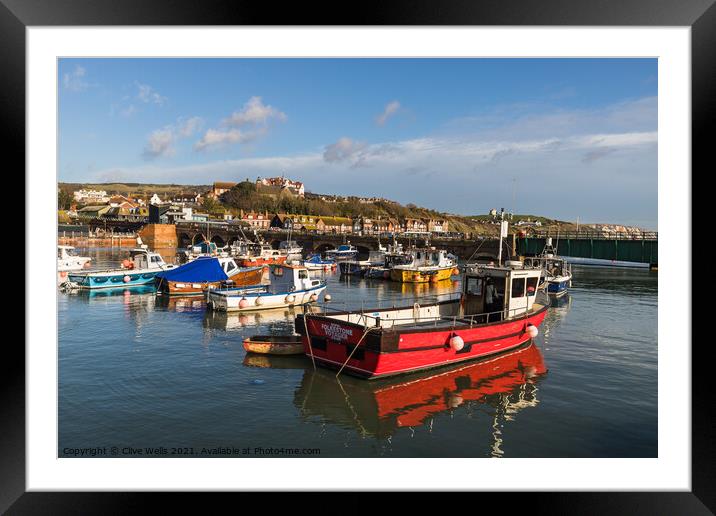 Fishing boats at high tide Framed Mounted Print by Clive Wells