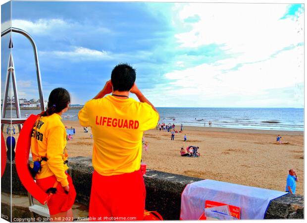 Two Lifeguards on duty. Canvas Print by john hill
