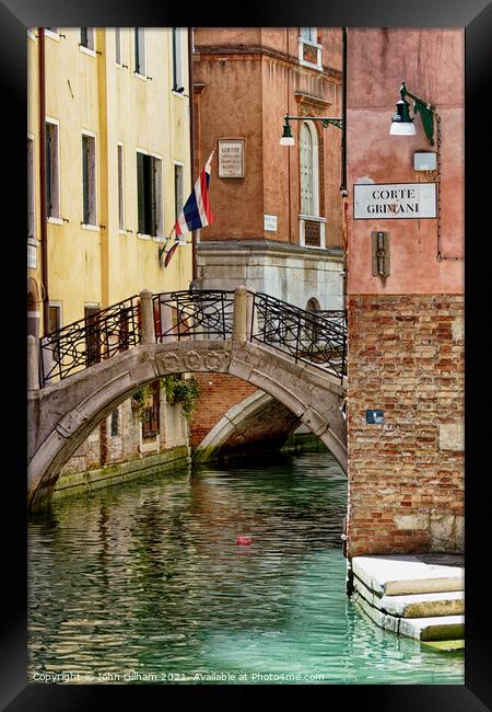 Calm Quiet Canal in Venice Italy Framed Print by John Gilham