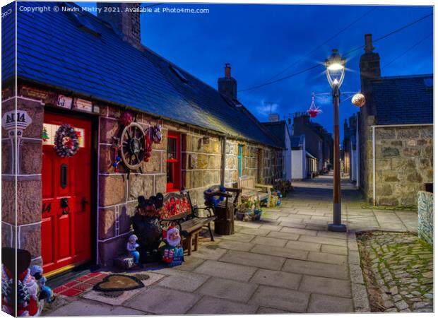 Fisherman's Cottages in Footdee or Fittie, Aberdee Canvas Print by Navin Mistry