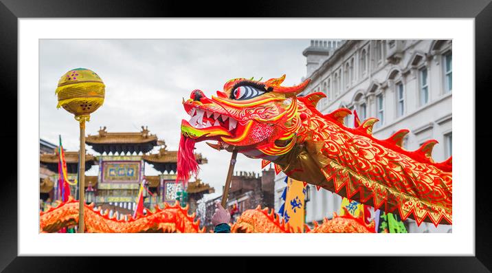 Dragon reaching for the pearl Framed Mounted Print by Jason Wells