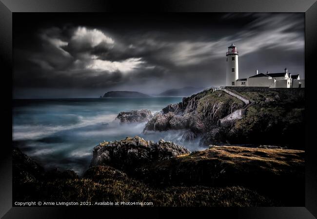 Dramatic Encounter of Storm and Lighthouse Framed Print by Arnie Livingston