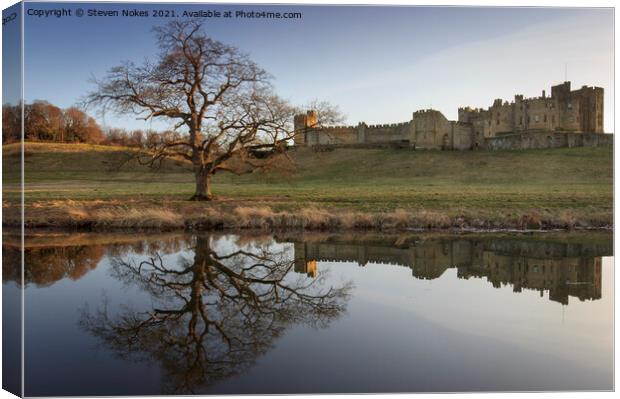Majestic Alnwick Castle in Golden Reflections Canvas Print by Steven Nokes