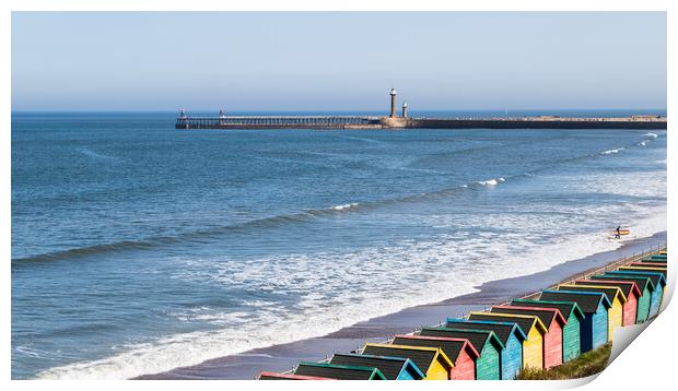 Surfer exiting the water at Whitby Print by Jason Wells