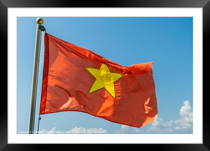 Close up of the red Vietnam National Flag with a gold star in the middle Framed Mounted Print by SnapT Photography
