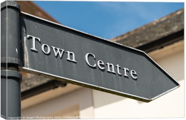 Old vintage town centre arrow shaped sign, pointing the direction Canvas Print by SnapT Photography