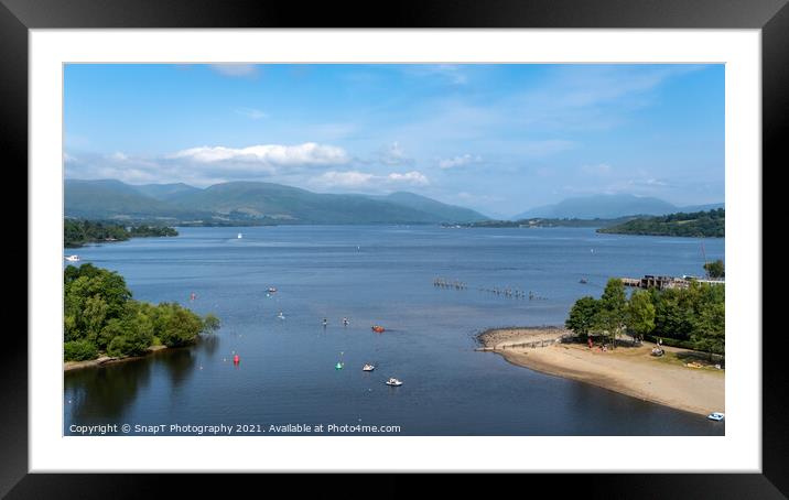 View over Loch Lomond from Lomond shores on a sunny summer day in Scotland Framed Mounted Print by SnapT Photography