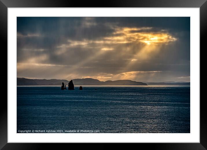Dramatic sky lights up the Drongs, Shetland Framed Mounted Print by Richard Ashbee