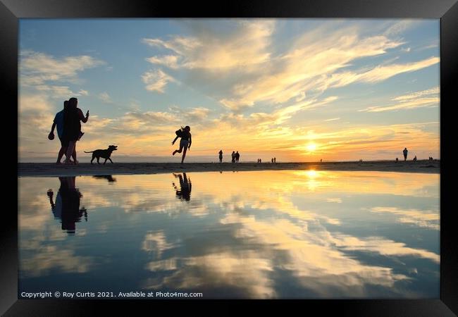 The Joy of a Sunset Framed Print by Roy Curtis