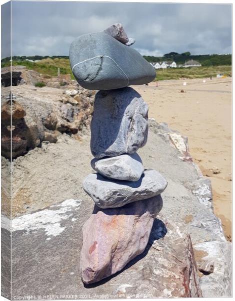 Stack of stones at the beach Canvas Print by HELEN PARKER