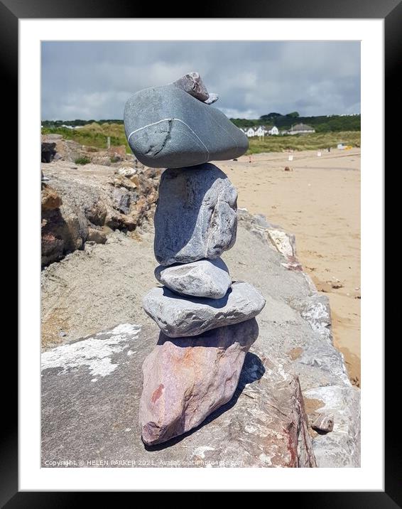 Stack of stones at the beach Framed Mounted Print by HELEN PARKER