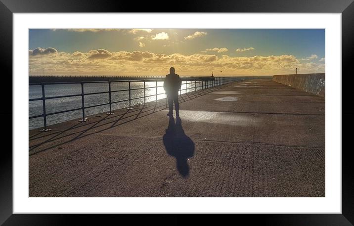 Man and his shadow at sunaet Framed Mounted Print by HELEN PARKER