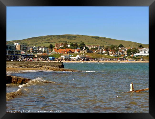 Swanage bay and seafront, Dorset, UK. Framed Print by john hill