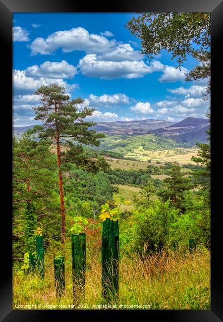 Verdant Valley Vista Framed Print by Roger Mechan