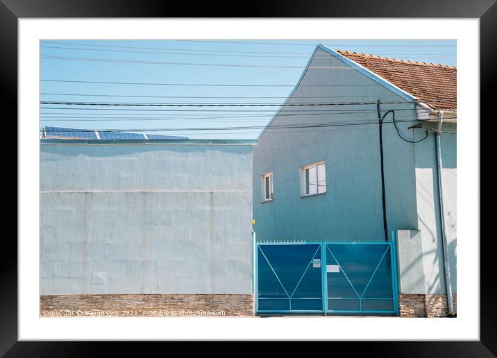 Blue house exterior Framed Mounted Print by Sanga Park