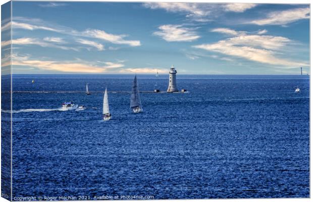 Guided by the Lighthouse Canvas Print by Roger Mechan