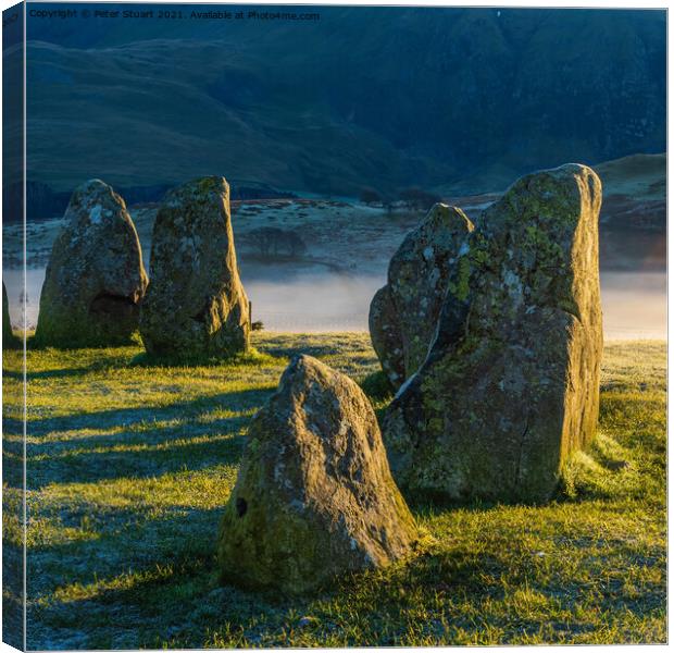 Sunrise at the Winter solstice at Castlerigg Stone Circle near K Canvas Print by Peter Stuart