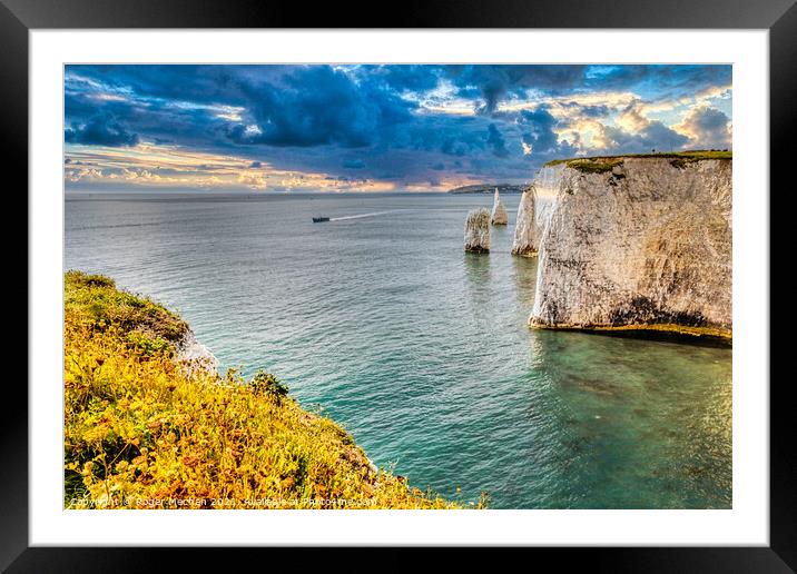 Limestone Stacks Rising From the Sea Framed Mounted Print by Roger Mechan