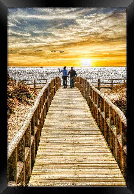 Sunset Stroll on the Boardwalk Framed Print by Roger Mechan