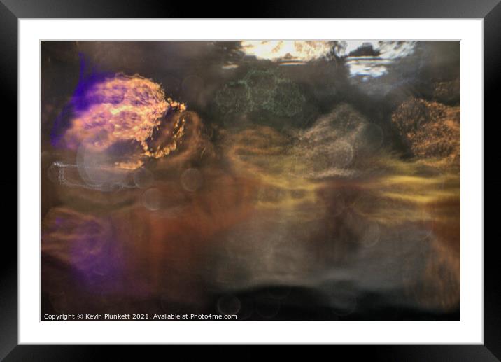 lights through diffused glass Framed Mounted Print by Kevin Plunkett
