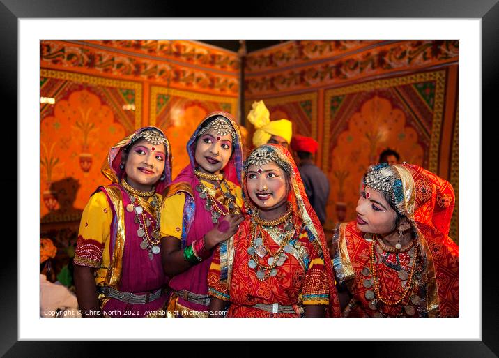 Dances in traditional costume at the Camel fair Jaisalmer. Framed Mounted Print by Chris North