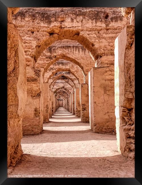 Arches of Red Walls Framed Print by Roger Mechan
