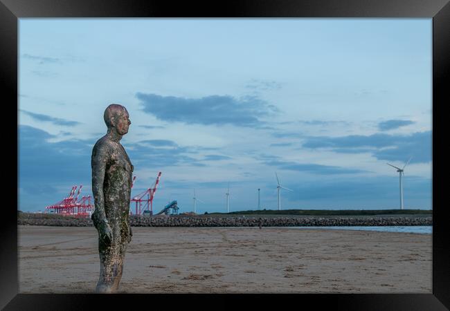 Iron Man stood next to Seaforth Docks Framed Print by Jason Wells