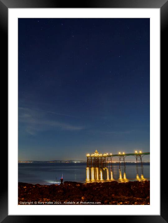Fisherman and Clevedon Pier at night Framed Mounted Print by Rory Hailes