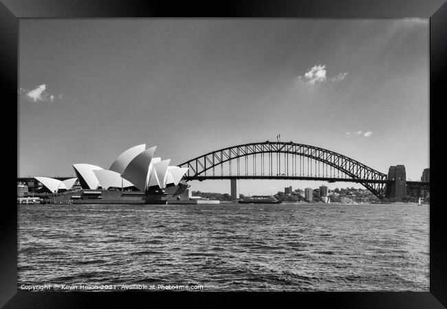 View of the Opera House in Sydney Harbor. The Sydney Harbour Bri Framed Print by Kevin Hellon