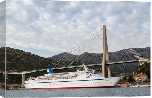 Boat by Dubrovnik's suspension bridge Canvas Print by Jason Wells