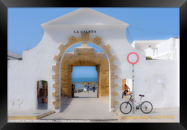 The entrance to La Caleta beach in Cadiz Framed Print by Piers Thompson