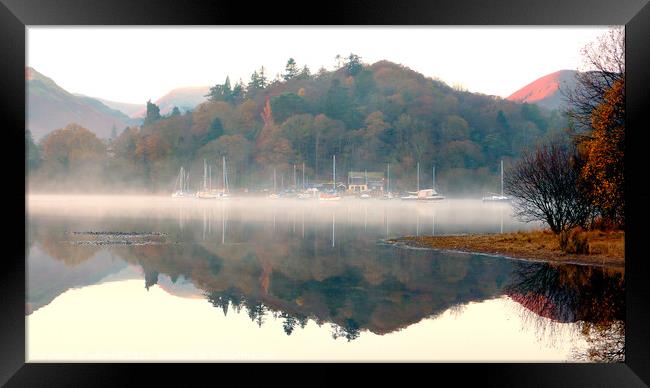 Reflections of Yachts at dawn in the morning mist. Framed Print by john hill