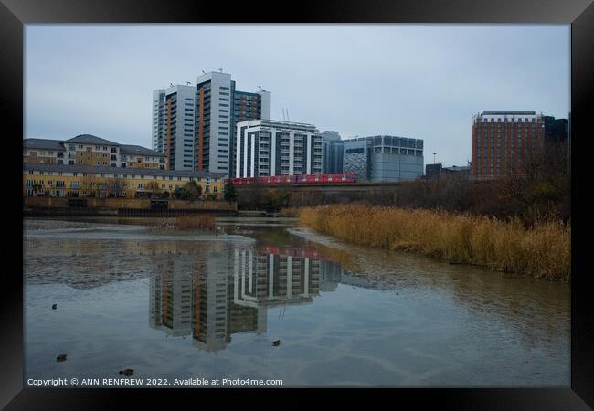 Reflections at East India Dock London Framed Print by ANN RENFREW