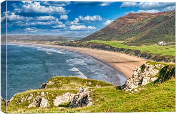 Serene expanse of Rhossili Bay Canvas Print by Roger Mechan