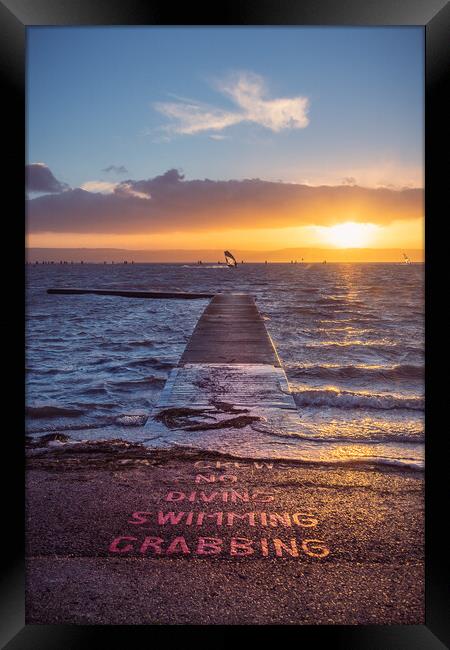 Surf the Sunset Framed Print by Liam Neon