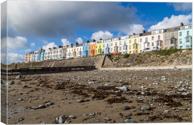 Colourful houses look down on Criccieth beach Canvas Print by Jason Wells