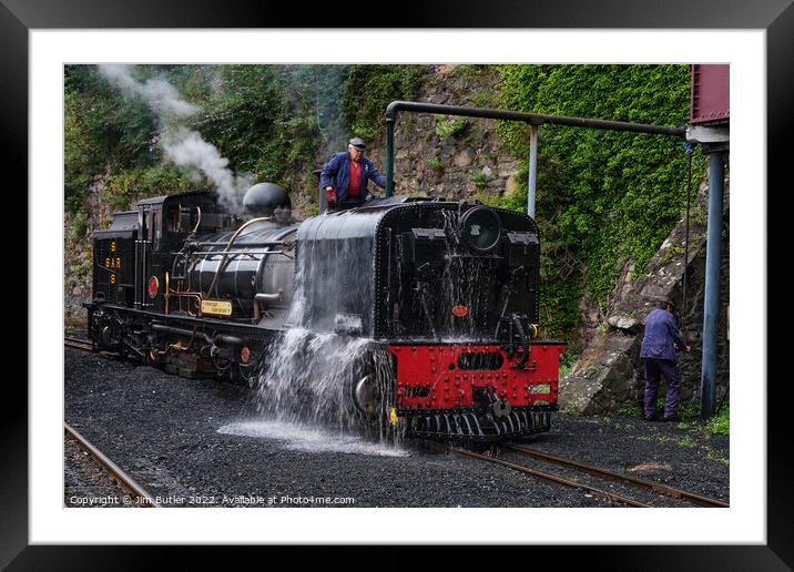 Steam train at the station Framed Mounted Print by Jim Butler