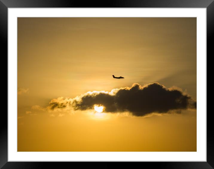 Plane in the sunset  Framed Mounted Print by Gail Johnson