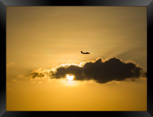 Plane in the sunset  Framed Print by Gail Johnson