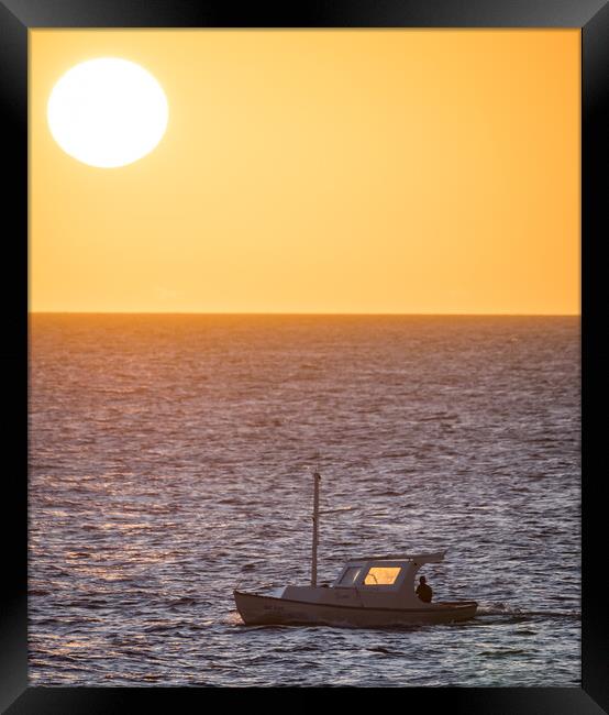 Fishing at sunset  Framed Print by Gail Johnson