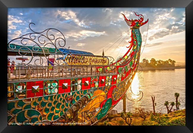 Dragon boat prow at sunset Framed Print by Kevin Hellon
