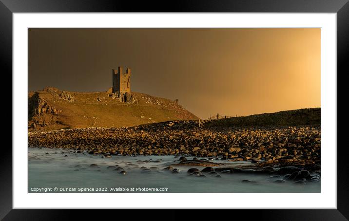 Dunstanburgh Castle at Sunset, Northumberland. Framed Mounted Print by Duncan Spence